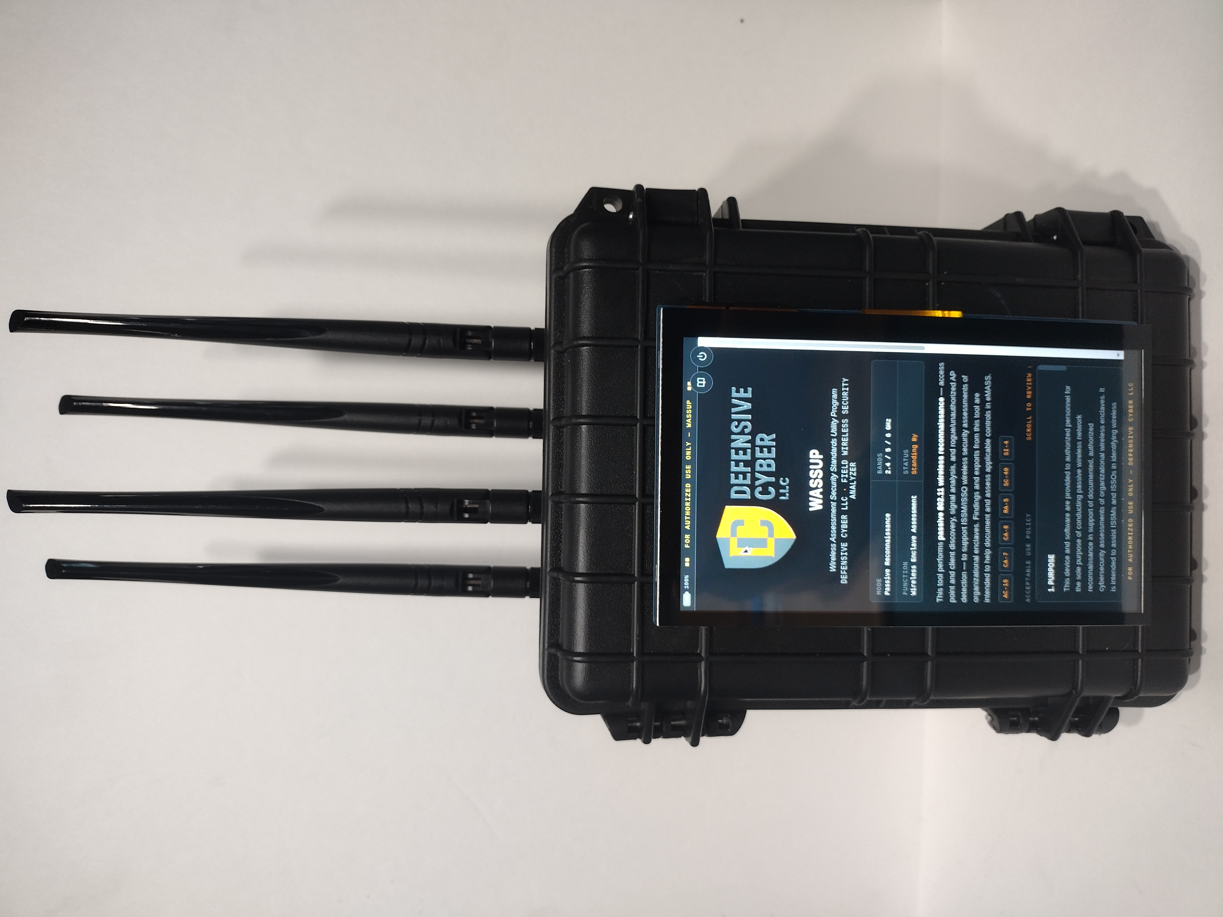 The WASSUP unit powered on, showing the splash screen